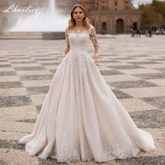 Lhuilier A-line Scoop Neck Beaded Wedding Dresses 2022 Lace Appliques Long Sleeves Court Train Floor Length Bridal Dress