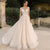 Boho Lace Tulle Wedding Dress  Princess Champagne A-Line V-Neck Long Sleeves Appliques Illusion Backless With Button Bridal Gown