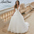 LoveDress A-Line Wedding Dress Deep V-Neck Sleeveless Sexy Tulle Bride Gown Lace Appliques Backless Court Train Vestido de noiva